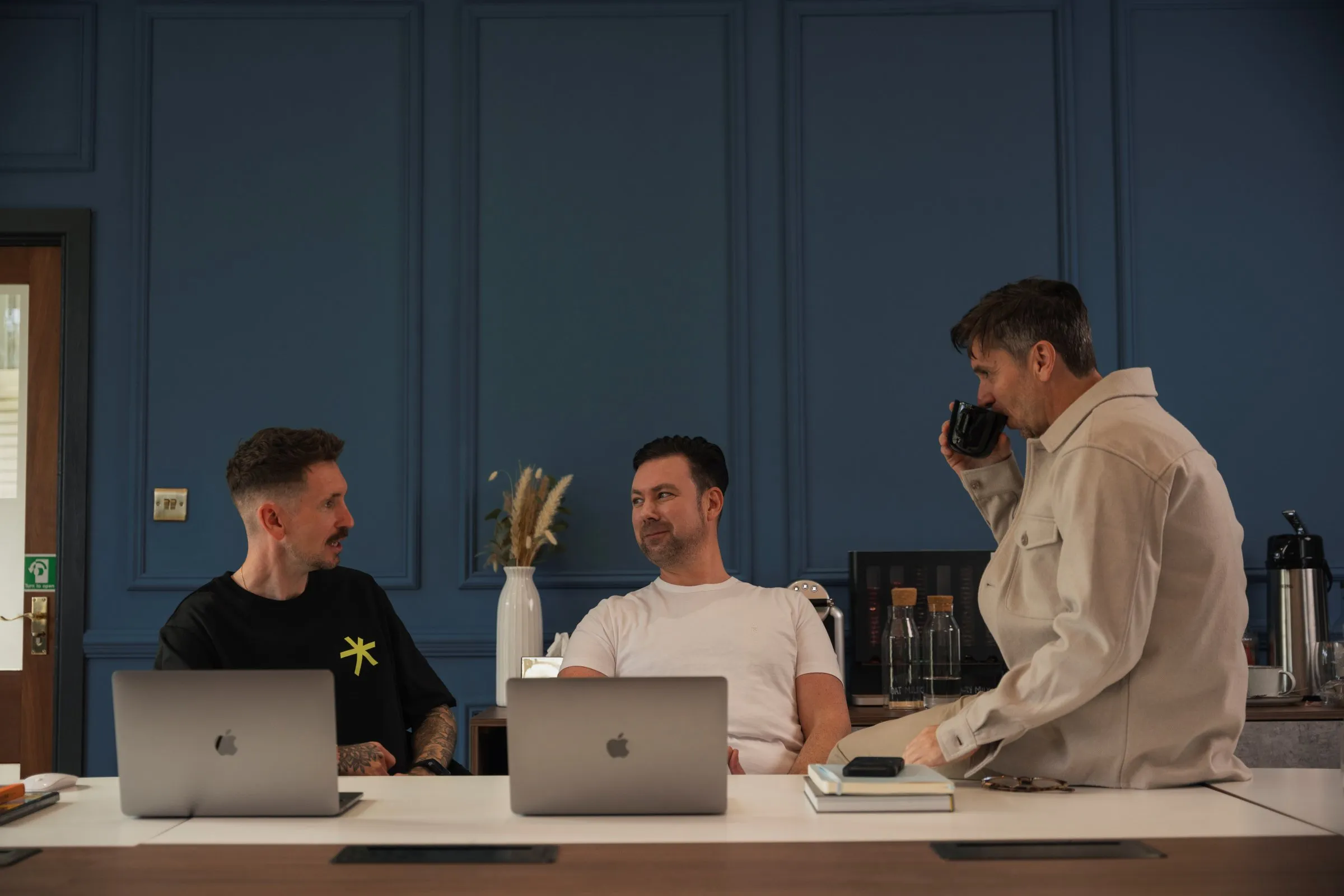 The Adigi team working in the studio