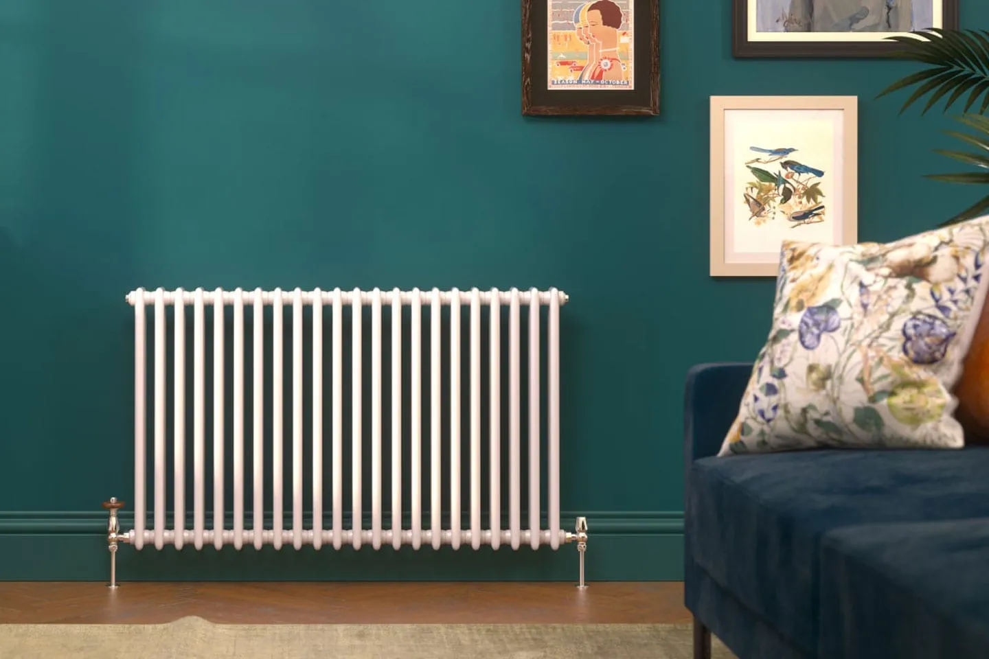 A white designer radiator against a teal wall
