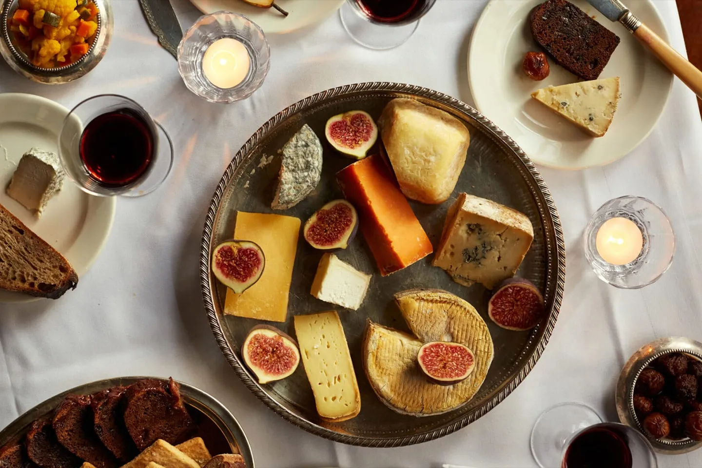 A Cubitt House cheese board with figs and crackers