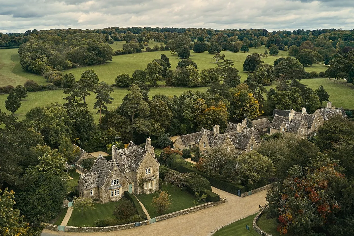 Daylesford cottages among fields and woodland, seen from above