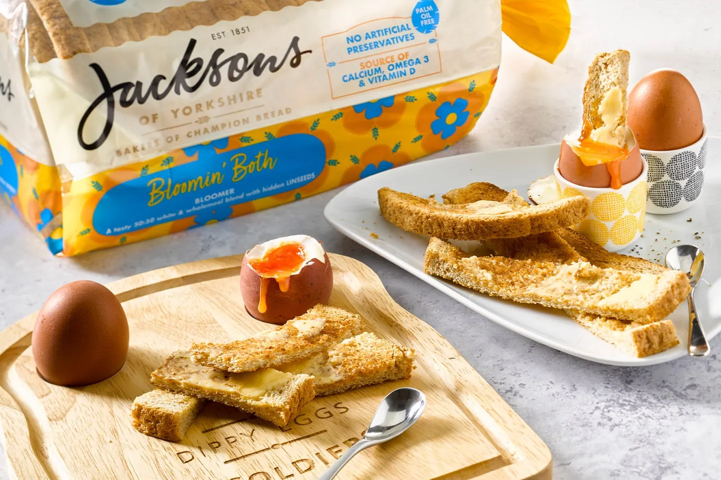 Boiled eggs and toast soldiers beside a Jacksons of Yorkshire Bloomin’ Both loaf