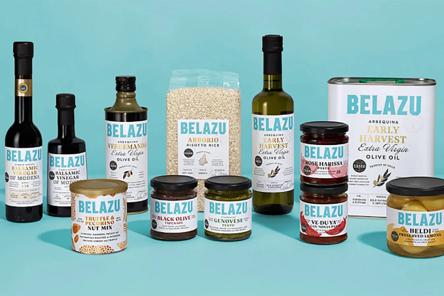Belazu oils, vinegars and jars on a blue background