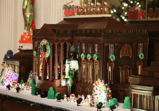 WASHINGTON, DC - DECEMBER 02: A chocolate gingerbread house is on display in the State Dining Room during first lady Michelle Obama's preview of the 2015 holiday decor at the White House December 2, 2015 in Washington, DC. As part of the Joining Forces initiative, the first lady welcomed military families to the White House for the first viewing of the 2015 holiday decorations. (Photo by Mark Wilson/Getty Images)